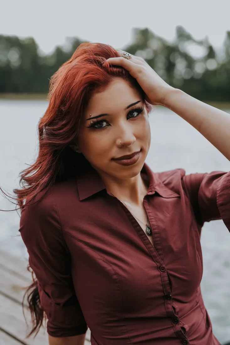 Senior portrait, close-up by the water