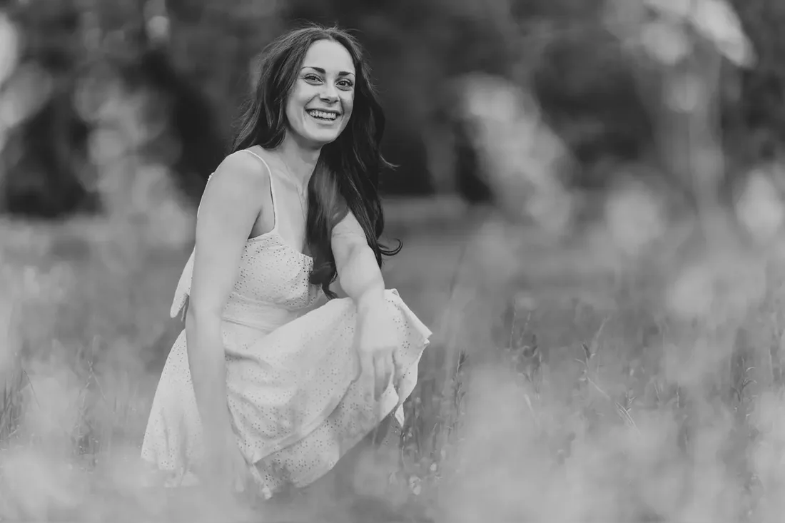 Senior portrait laughing, black and white