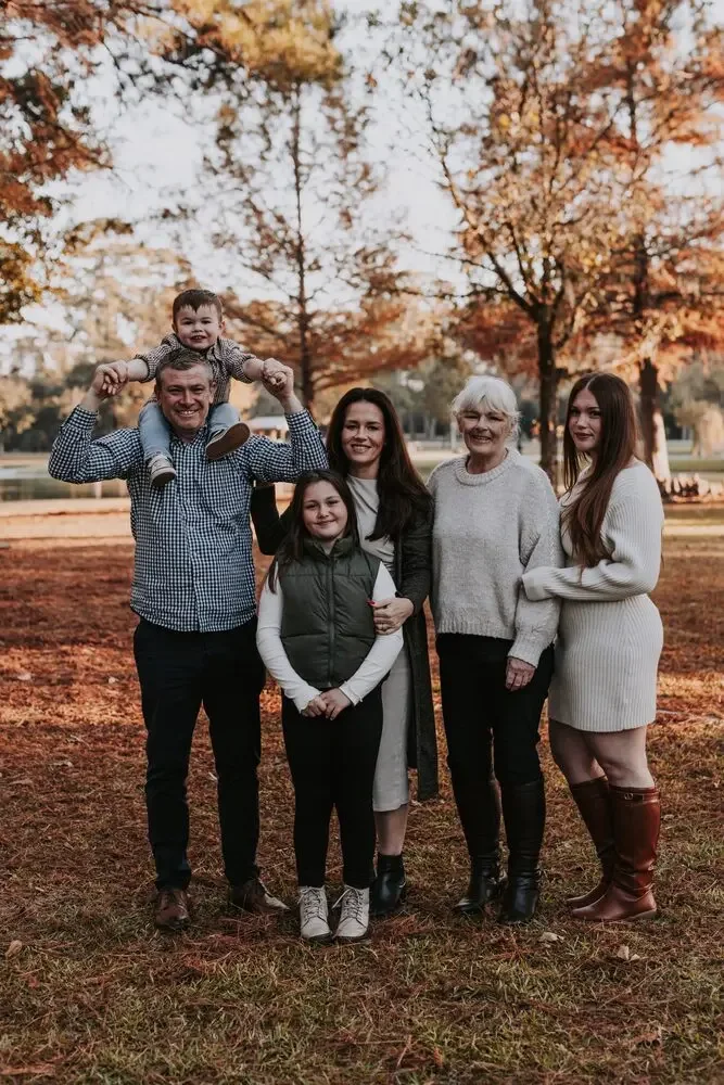 Three generations of a family together outdoors