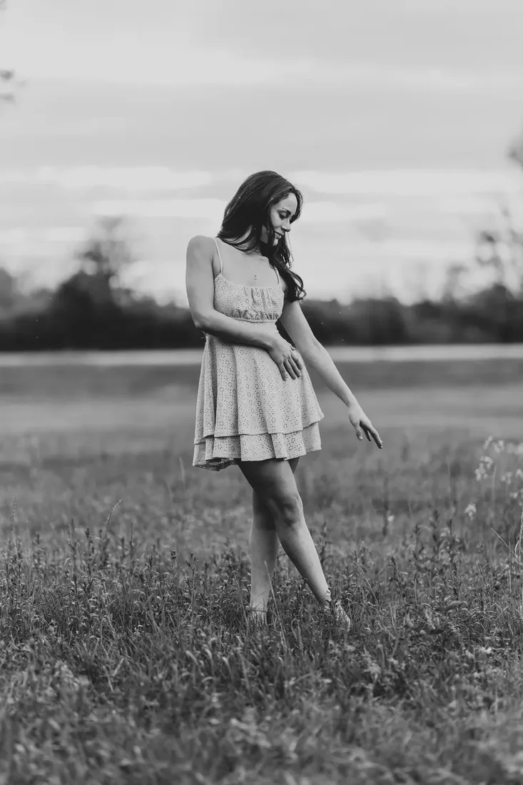 Senior portrait in a flowing dress, black and white